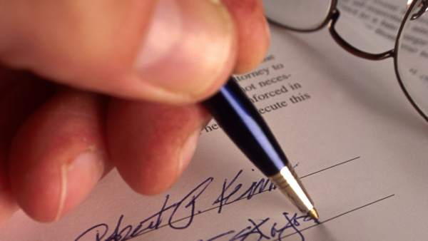 Firma de un contrato Firma de un contrato